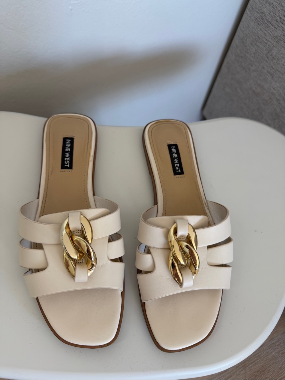 Nine West Cream Slide Sandals with Gold Chain Accent